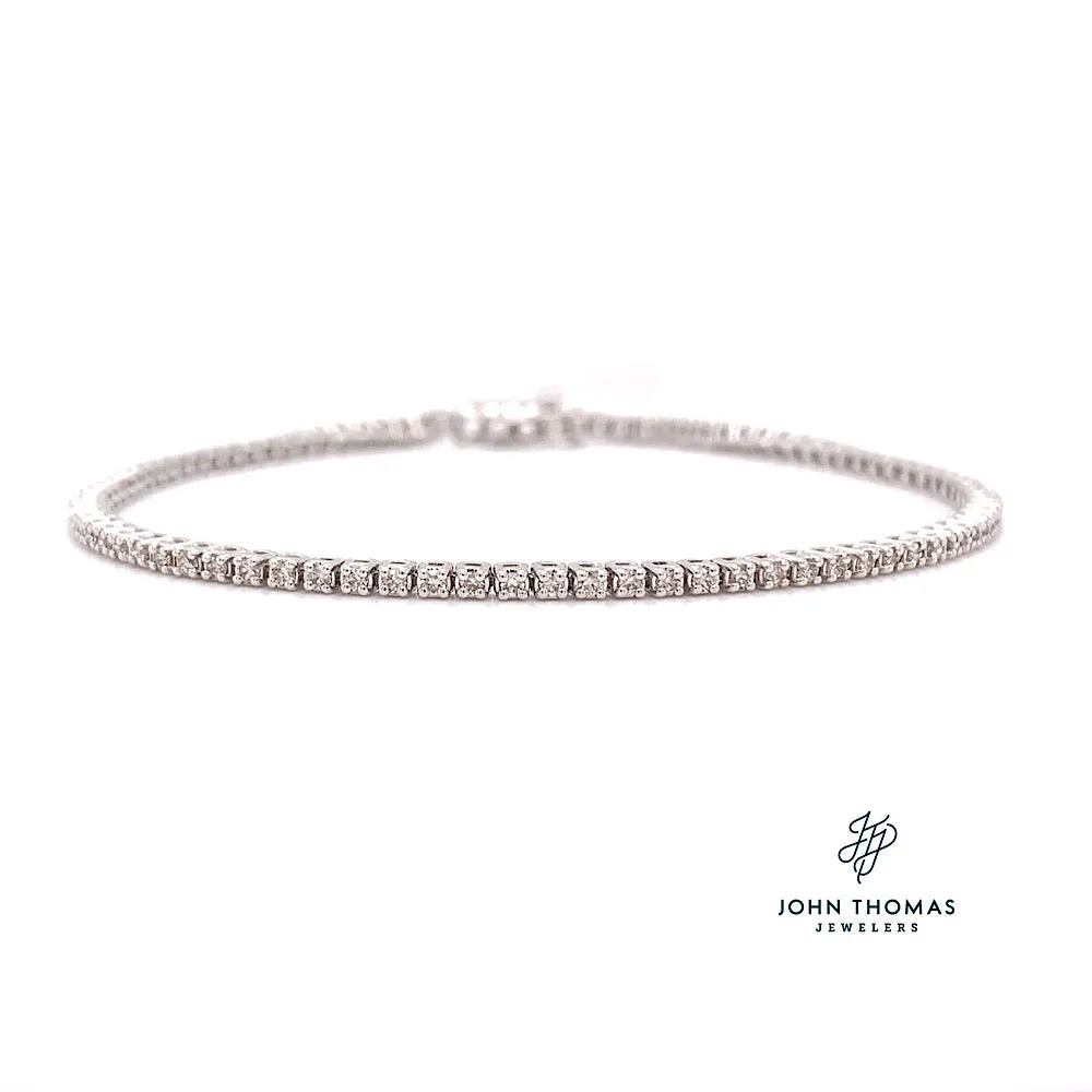 10 KARAT WHITE DIAMOND TENNIS BRACELET 1.02CTW