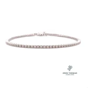 10 KARAT WHITE DIAMOND TENNIS BRACELET 1.02CTW