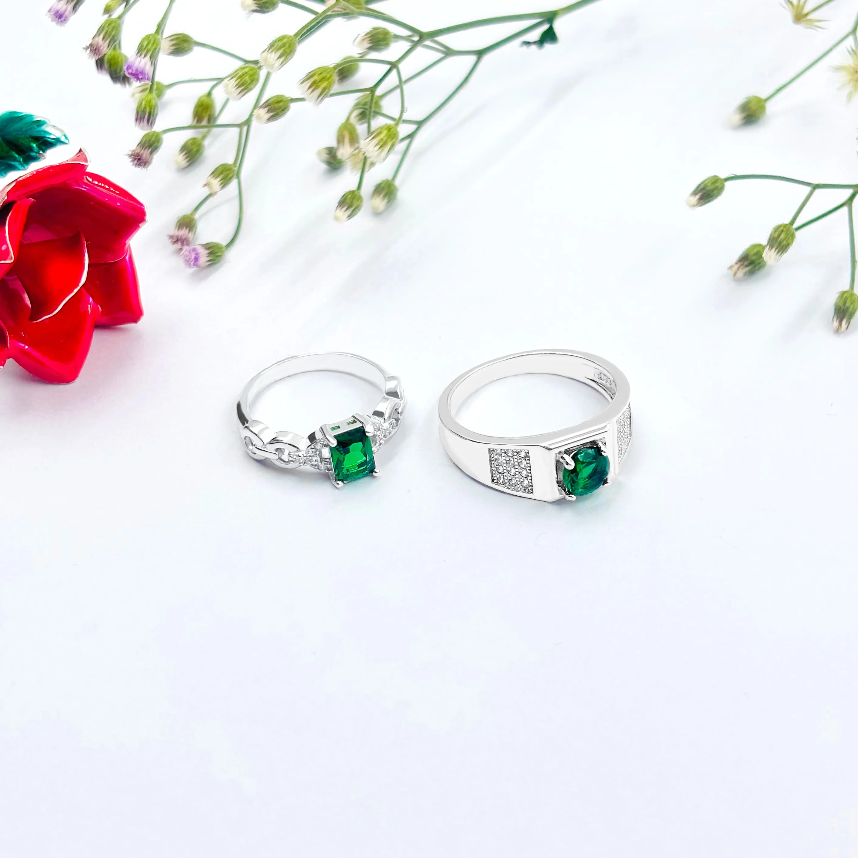 Stylish Silver Couple Rings with Elegant Green Stone in the Middle.