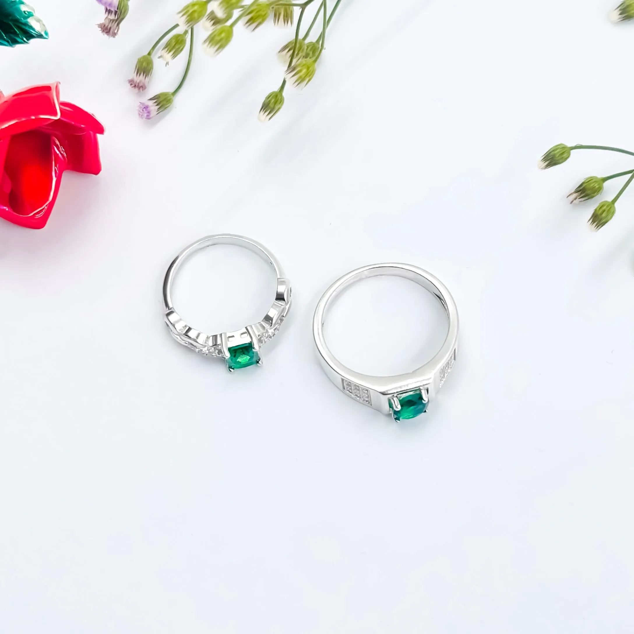 Stylish Silver Couple Rings with Elegant Green Stone in the Middle.
